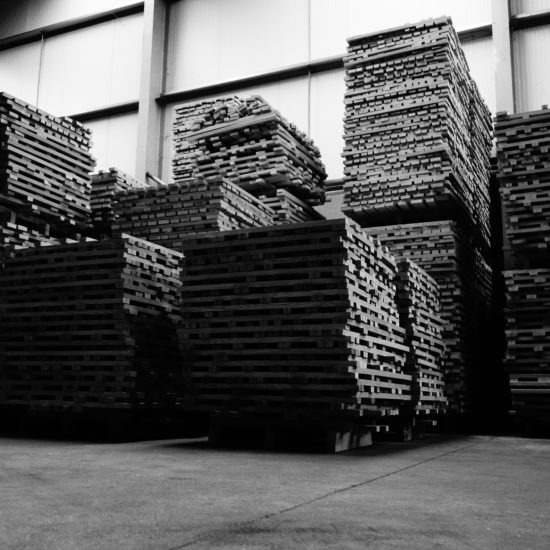 wood piled in factory